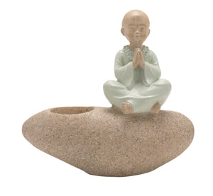 Meditating Buddha On Pebbles Candle Holder