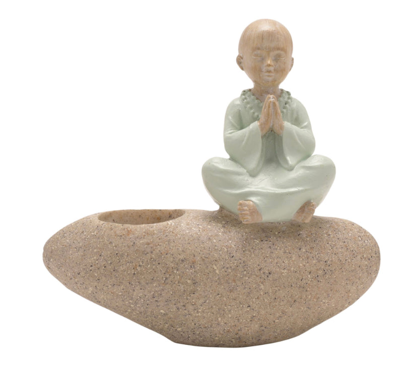 Meditating Buddha On Pebbles Candle Holder