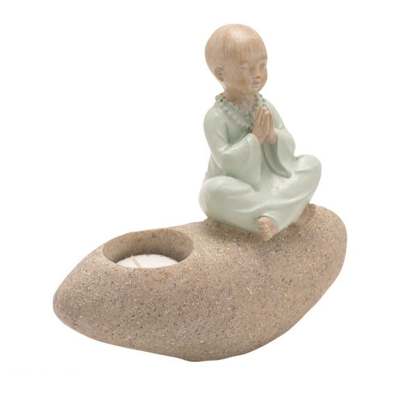 Meditating Buddha On Pebbles Candle Holder