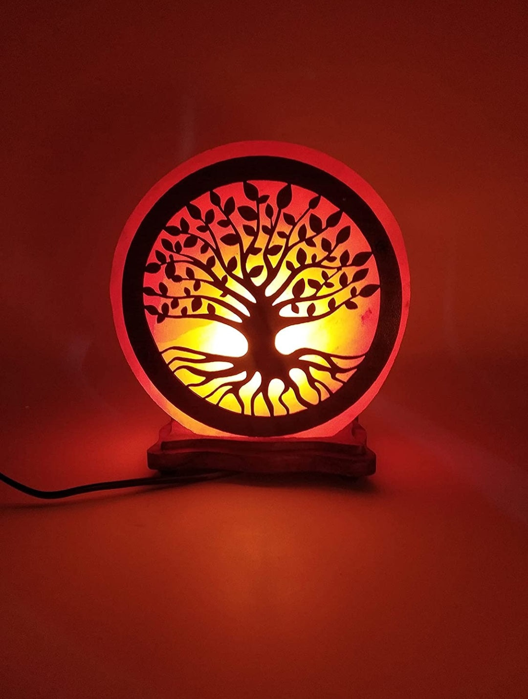 Himalayan salt lamp with tree of life motif