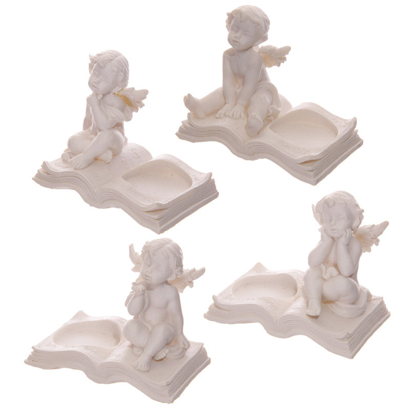 Cherub Tea Light Holder Sitting on Book